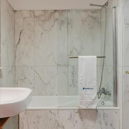 Hostwise - Elegant Riverfront Flat | Pool & Sports Daire